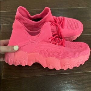 Hot pink tennis shoes
